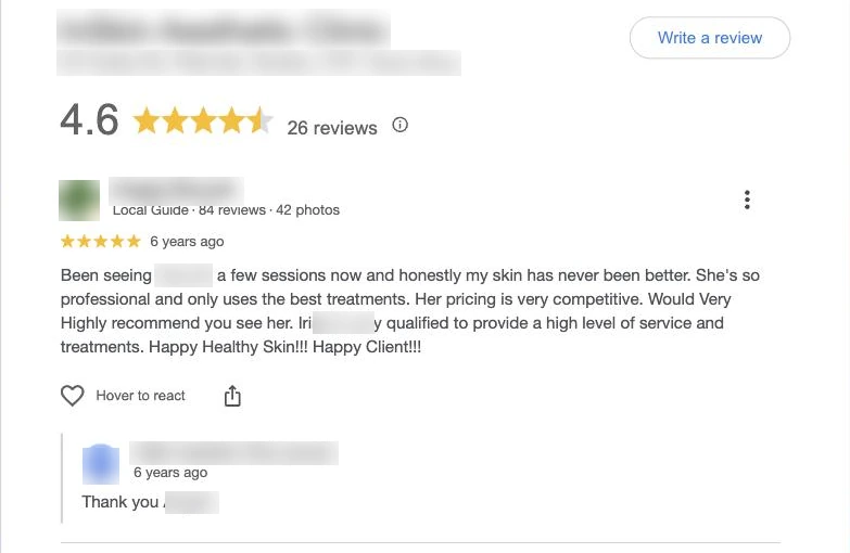A Google review with five stars and a written reply from the business owner beneath it, showing how to respond to reviews
